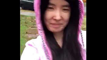 asian teen publicly reveals herself in the rain